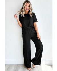 Azura Exchange - Schwarzes T-Shirt Mit Einfarbigem Design 2-Teiliges Set Mit Weiter Hose - Lyst