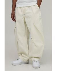 BoohooMAN - Elasticated Waist Balloon Fit Double Leg Pleat Detail Twill Trousers - Lyst