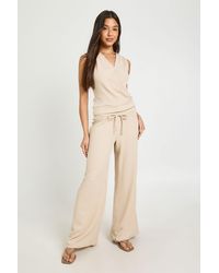Boohoo - V Neck Wrap Over Deep Hem Top And Wide Leg Trouser Coord - Lyst