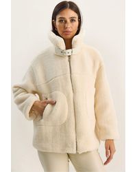 Bianco Lucci - Oversized Plush Knitted Puffer Jacket With Zipper Closure - Lyst
