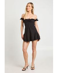 Boohoo - Petite Broderie Bardot Ruffle Hem Mini Dress - Lyst