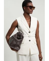 Karen Millen - Petite Tailored Structured Crepe Belted Sleeveless Blazer - Lyst