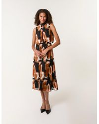 Blue Vanilla - Sleeveless Puffball High Neck Printed Dress - Lyst