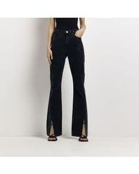 River Island - Flared Jeans Black Coated High Waisted Cotton - Lyst