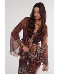 Nasty Gal - Mixed Animal Crinkle Chiffon Ruffle Tie Front Blouse - Lyst