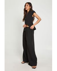 Boohoo - Pleat Front Wide Leg Tailored Trousers - Lyst