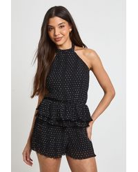 Boohoo - Polka Dot Plisse Halterneck Playsuit - Lyst
