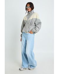Boohoo - Cinched Waist Panelled Funnel Neck Jacket - Lyst