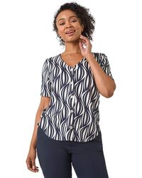 Roman - Petite Geo Print V-Neck Stretch Blouse - Lyst