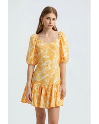 Hiccup - Floral V Neck Ruffled Balloon Sleeves Mini Dress - Lyst