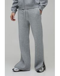 BoohooMAN - Baggy Flared Fit Split Hem Joggers - Lyst