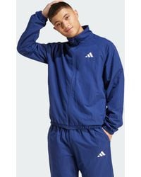 adidas - Essential Small Logo Windbreaker - Lyst