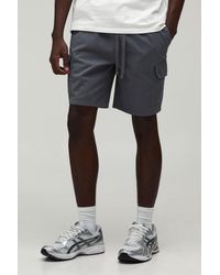 BoohooMAN - Relaxed Fit Elasticated Mid Length Twill Cargo Shorts - Lyst