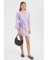 Hiccup - V Neck Balloon Sleeves Mini Wrap Dress - Lyst