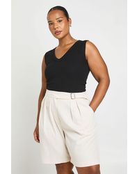 Boohoo - Plus Waist Detail Pleat Front Tailored Longline Shorts - Lyst