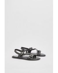 Wallis - Sheska Faux Leather Buckle Detail Asymmetrical Flat Sandals - Lyst