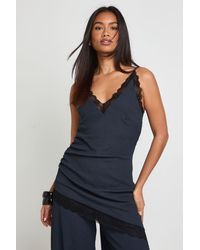 Boohoo - Crinkle Lace Trim Long Line Asymetric Cami Top - Lyst