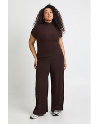 Boohoo - Plus Rib High Neck Cap Sleeve Top And Wide Leg Trousers Co Ord - Lyst