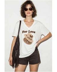 Bianco Lucci - Oversized V-Neck Printed T-Shirt - Lyst