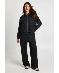 Boohoo - Interlock Cargo Pocket Zip Through Bomber Sweatshirt - Lyst