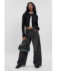 Boohoo - High Waist Supersoft Belted Pleated Wide Leg Jeans - Lyst