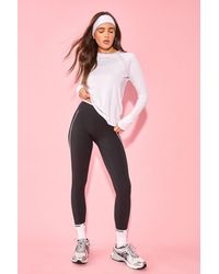 DSGN Studio - Sculpt Wrap Waist Piping Detail Legging - Lyst