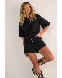 Nasty Gal - Denim Button Through Romper - Lyst