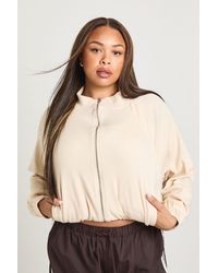 Boohoo - Plus Rib Funnel Neck Zip Up Jacket - Lyst