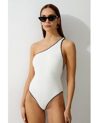 Karen Millen - Stitch Detail One Shoulder Cut Out Swimsuit - Lyst