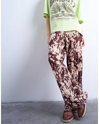 TOPSHOP - Abstract Animal Print Plisse Trousers - Lyst