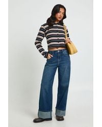 Boohoo - Petite Turn Up High Waist Wide Leg Jean - Lyst