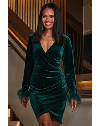 Sosandar - Emerald Velvet Feather Cuff Wrap Pencil Dress - Lyst