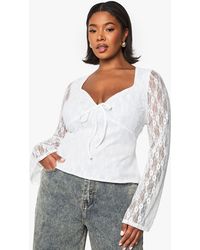 Boohoo - Plus Tie Front Long Sleeve Flare Sleeve Top - Lyst