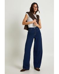 Boohoo - Tall Mid Waist Twisted Seam Barrel Leg Jean - Lyst