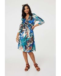 Izabel London - Leaf Print Knee Length Wrap Dress - Lyst