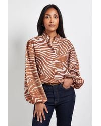 Wallis - Petite Animal Ruffle Collar Button Blouse - Lyst