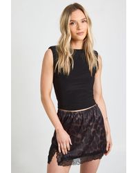 Boohoo - Petite Satin Lace Trim Mini Skirt - Lyst
