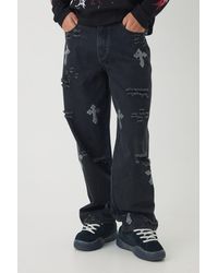 BoohooMAN - Relaxed Fit Rhinestone Cross Ripped Washed Jeans - Lyst