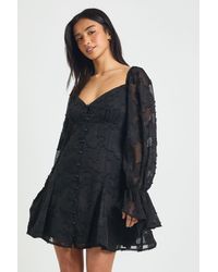 Boohoo - Petite Burnout Floral Godet Hem Mini Dress - Lyst