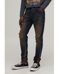 BoohooMAN - Crease Wash Ripped Knee Gusset Stacked Skinny Jeans - Lyst