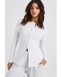Boohoo - Ribbed Longline Popper Front Top - Lyst