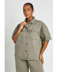 Boohoo - Plus Washed Denim Short Sleeve Shirt - Lyst
