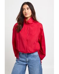 Boohoo - Tie Side Funnel Neck Lightweight Jacket - Lyst