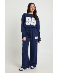 Boohoo - 98 Print Off Shoulder Striaght Leg Tracksuit - Lyst