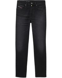 DIESEL - D-fining Taps Toelopende Pasvorm Effen Denim Jeans Met Zwarte Wassing - Lyst