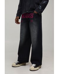 BoohooMAN - Baggy Fit Fuego Printed Washed Jeans - Lyst