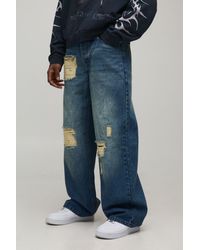 BoohooMAN - Baggy Fit Stacked Washed Ripped Jeans - Lyst