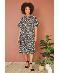 Yumi' - Organic Cotton Animal Print Tiered Tunic Dress - Lyst
