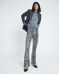 River Island - Leopard Print Bootcut Jeans - Lyst