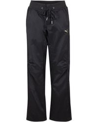 PUMA - Woven Pants - Lyst
